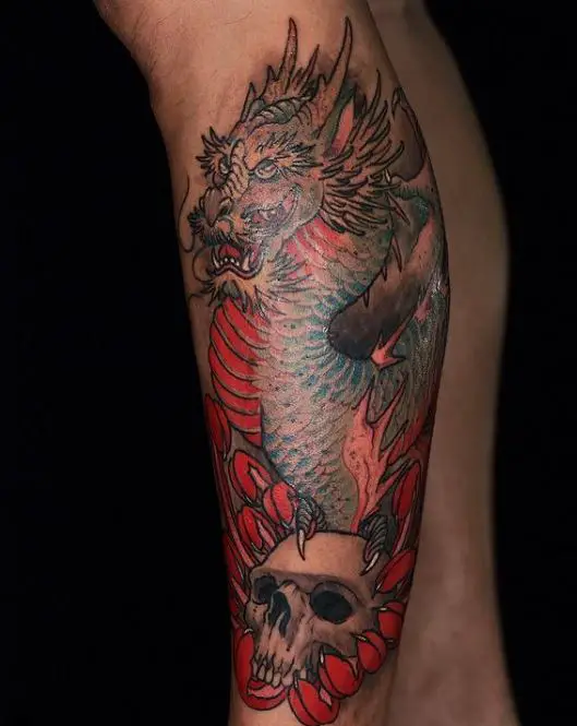 artistic dragon calf tattoo