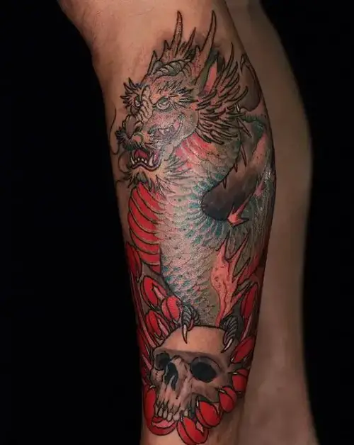 artistic dragon calf tattoo