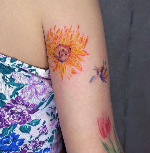 artistic sunflower and bee tattoo