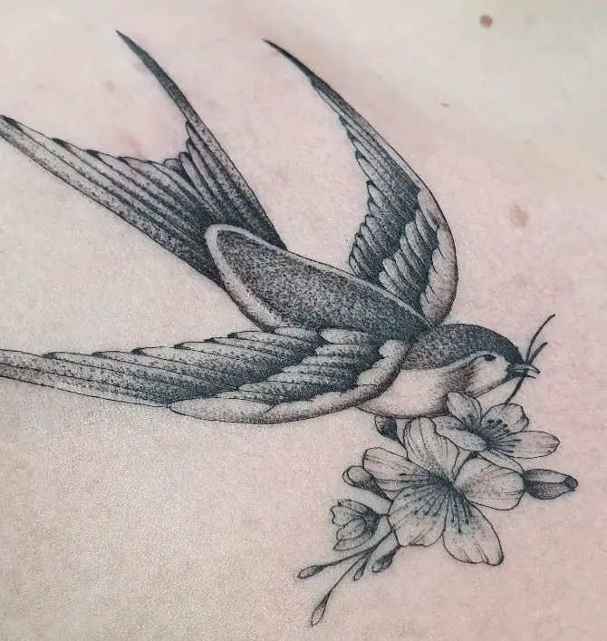 bird and flower matching sister tattoo