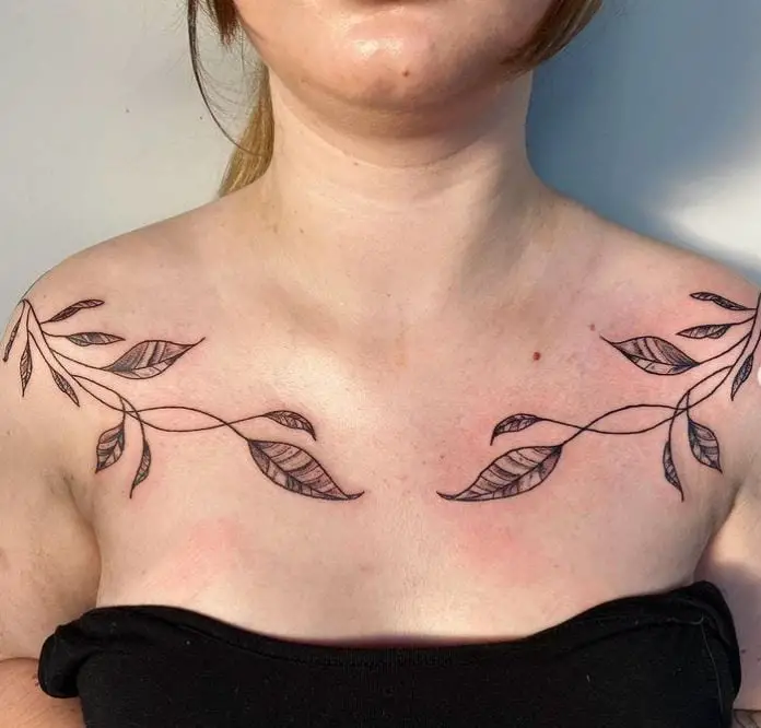 black and grey leaves tattoo