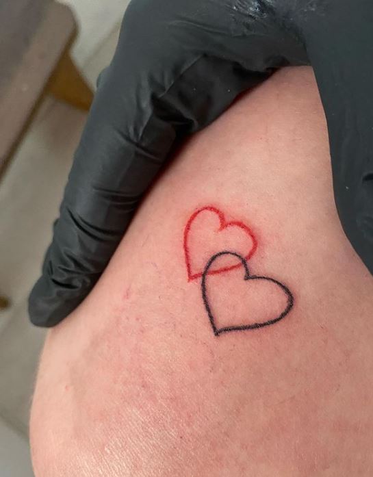 black and red hearts tattoo