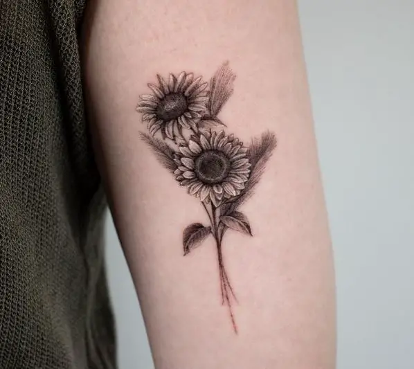 black, grey and white realistic sunflower tattoo