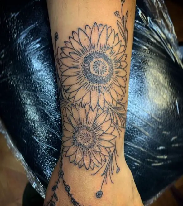 black work sunflower tattoo