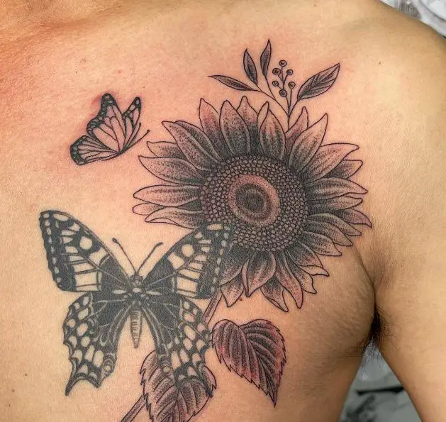 butterfly and a sunflower tattoo on the chest