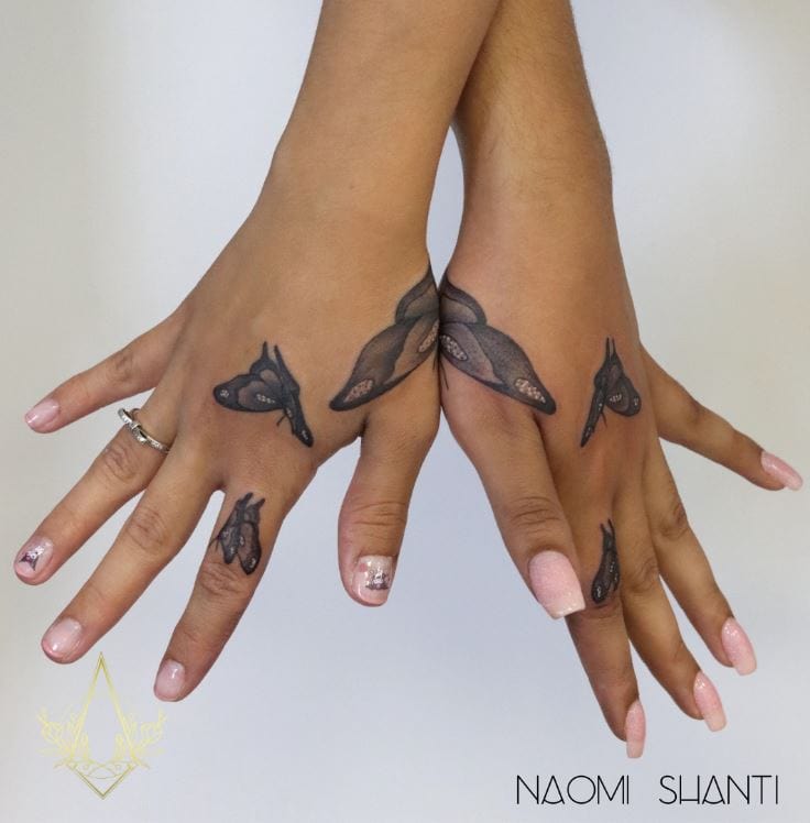 butterfly tattoos on hands