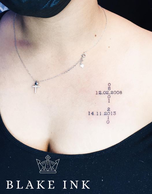 chest tattoo with dates