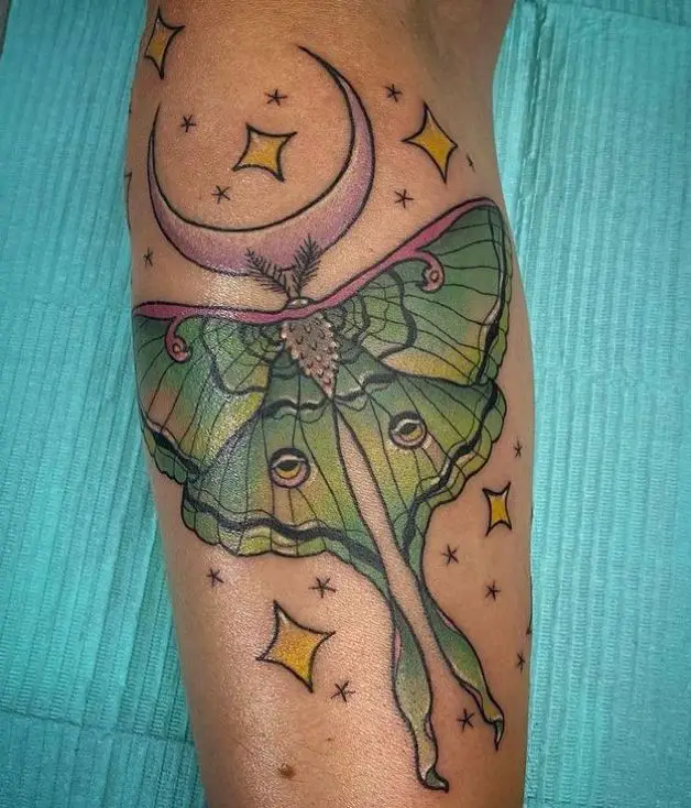 coloured butterfly tattoo with stars and moon