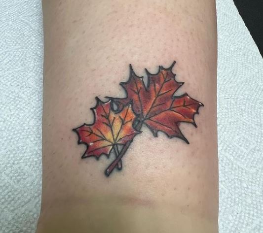 coloured leaf tattoo
