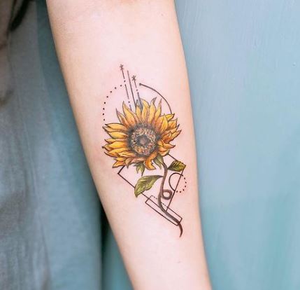 coloured sunflower tattoo on the hand