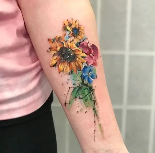 colourful floral tatoo on the hand
