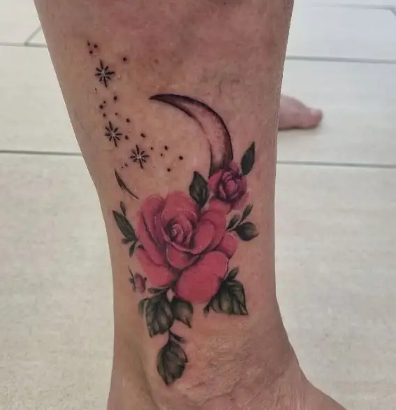 colourful roses tattoo with moon and stars