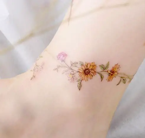 colourful sunflower band tattoo