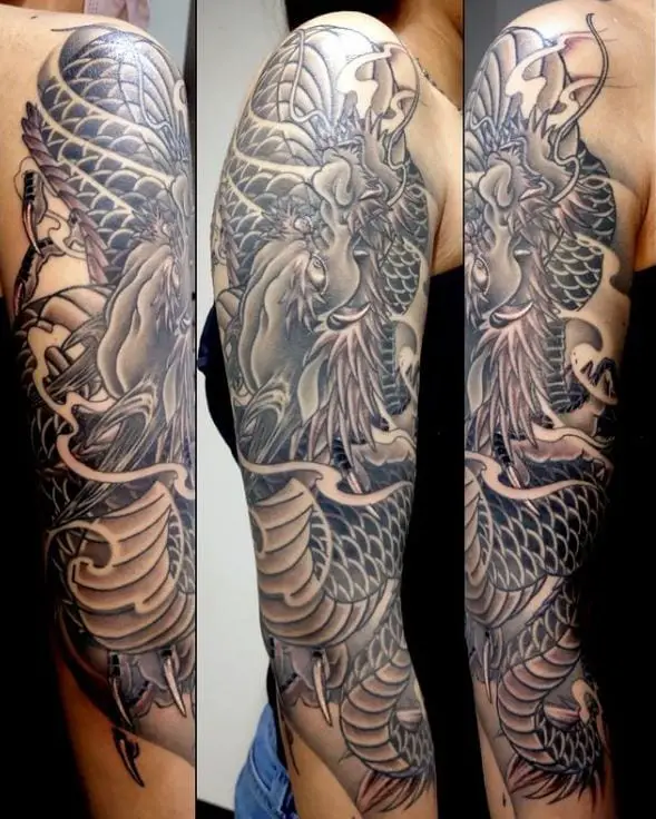 complex black and grey japanese dragon tattoo