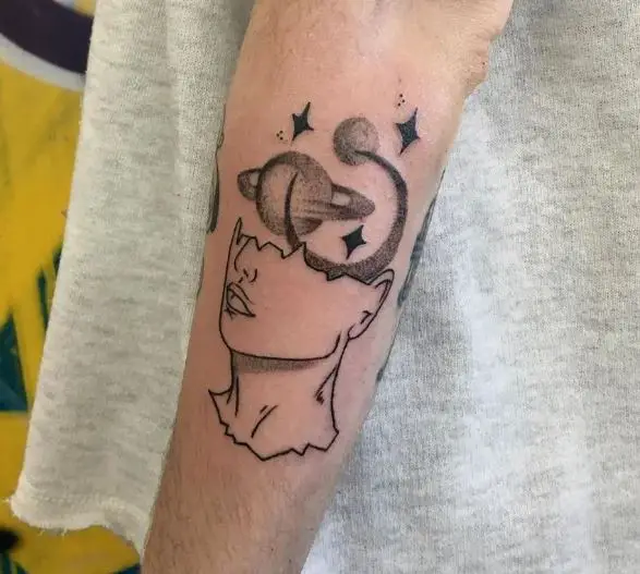 creative moon and stars tattoo with a face