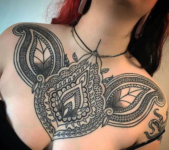 decorative chest tattoo with thick black lines