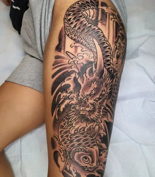 detailed dragon tattoo on the thigh