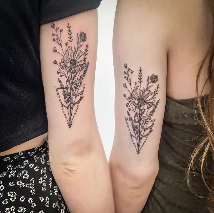 detailed floral sister tattoos