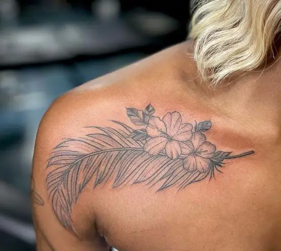feather and flowers tattoo