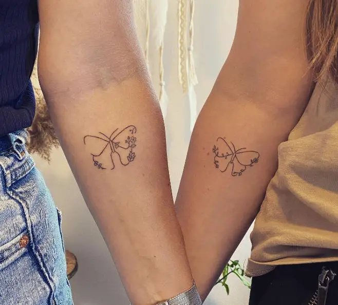 fine line butterfly sister tattoo