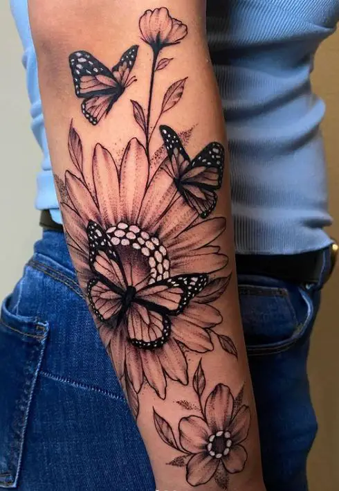 floral and butterflies tattoo