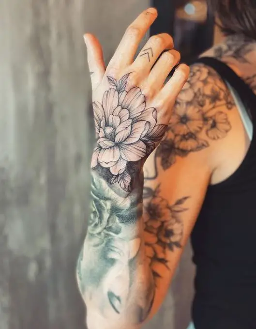 floral hand tattoo with shading