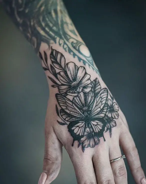 butterfly, and flowers full hand tattoo