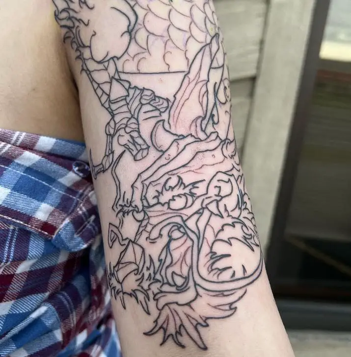 half sleeve dragon tattoo in progress