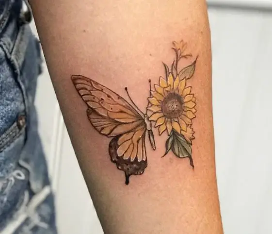 half sunflower half butterfly tattoo on the hand