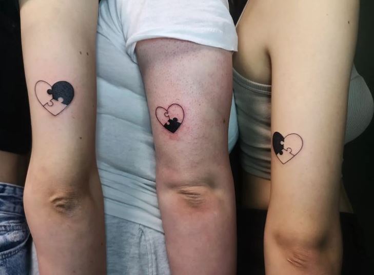 heart puzzle tattoos on 3 sisters