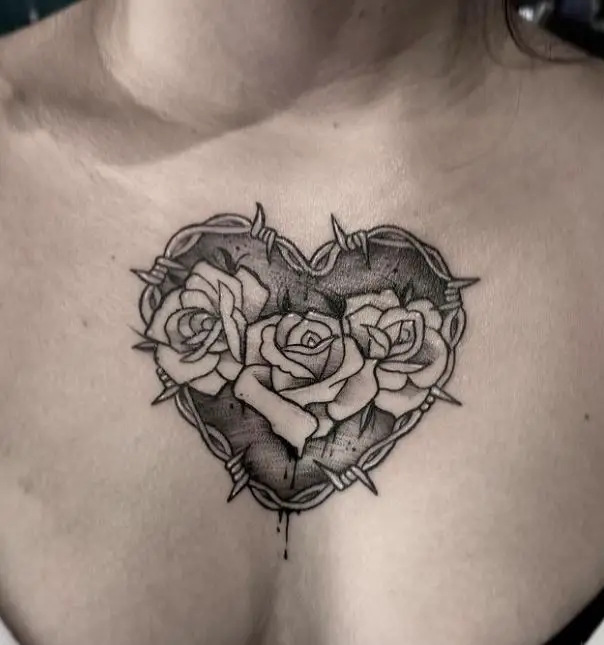 heart, roses and spikes tattoo