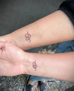 symbol for sisters tattoo