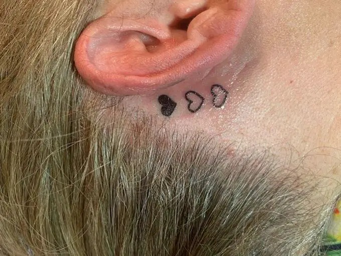 heart tattoo behind the ear