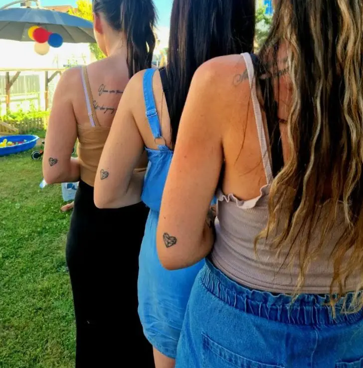 heart tattoos on 3 sisters