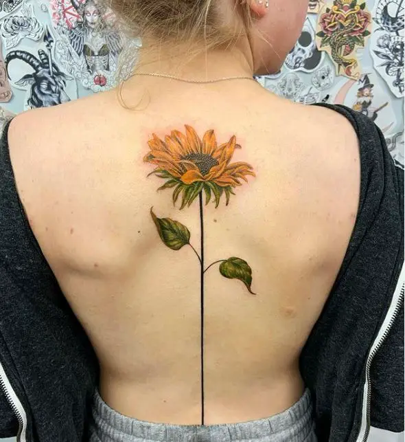 large sunflower tattoo on the back