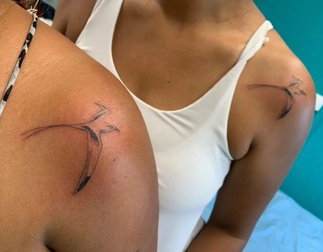 matching bird tattoos