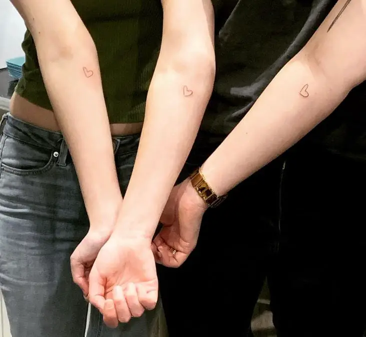 matching heart tattoos for sisters
