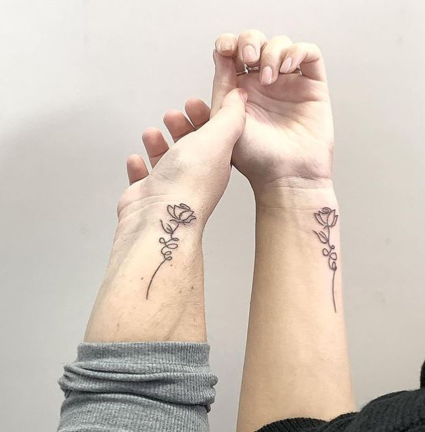 matching rose tattoos for sisters