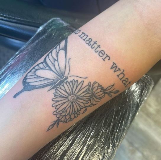 matching tattoo with wording and butterfly