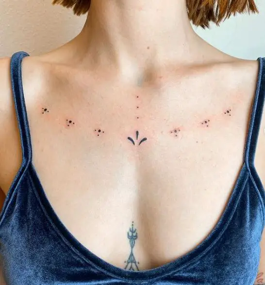 minimal chest tattoo