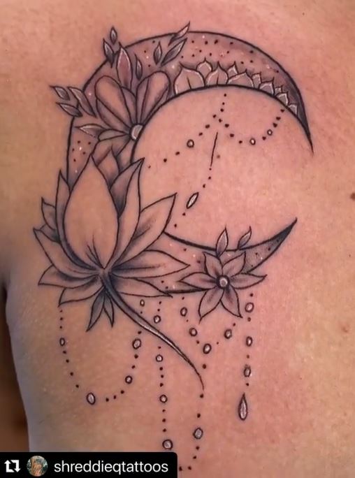 moon and flowers tattoo
