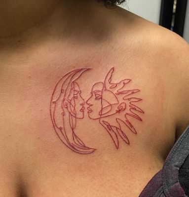 moon and sun faces tattoo in red