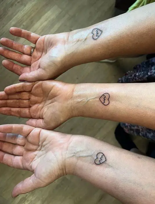 mountains inside hearts tattoos for 3 sisters