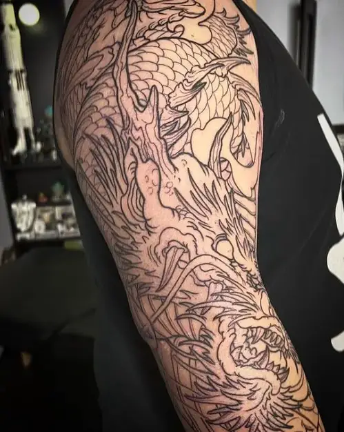non shaded full sleeve dragon tattoo