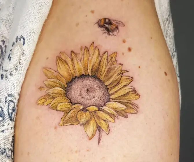 one detailed sunflower and bee tattoo in colour