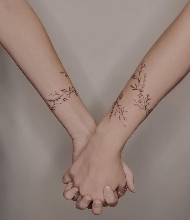 plant tattoos around the wrists