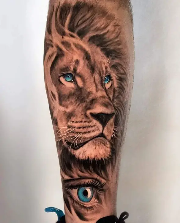 realistic lion tattoo on the leg