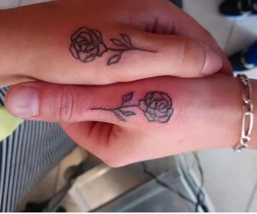 rose sister tattoos on the hand