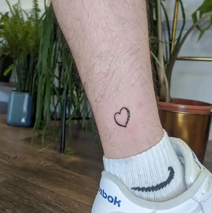 simple heart leg tattoo