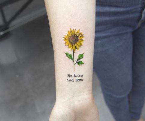 simple motivational sunflower tattoo